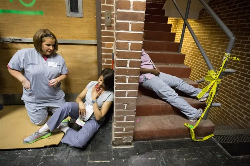 Participants in a medical training exercise at MERI