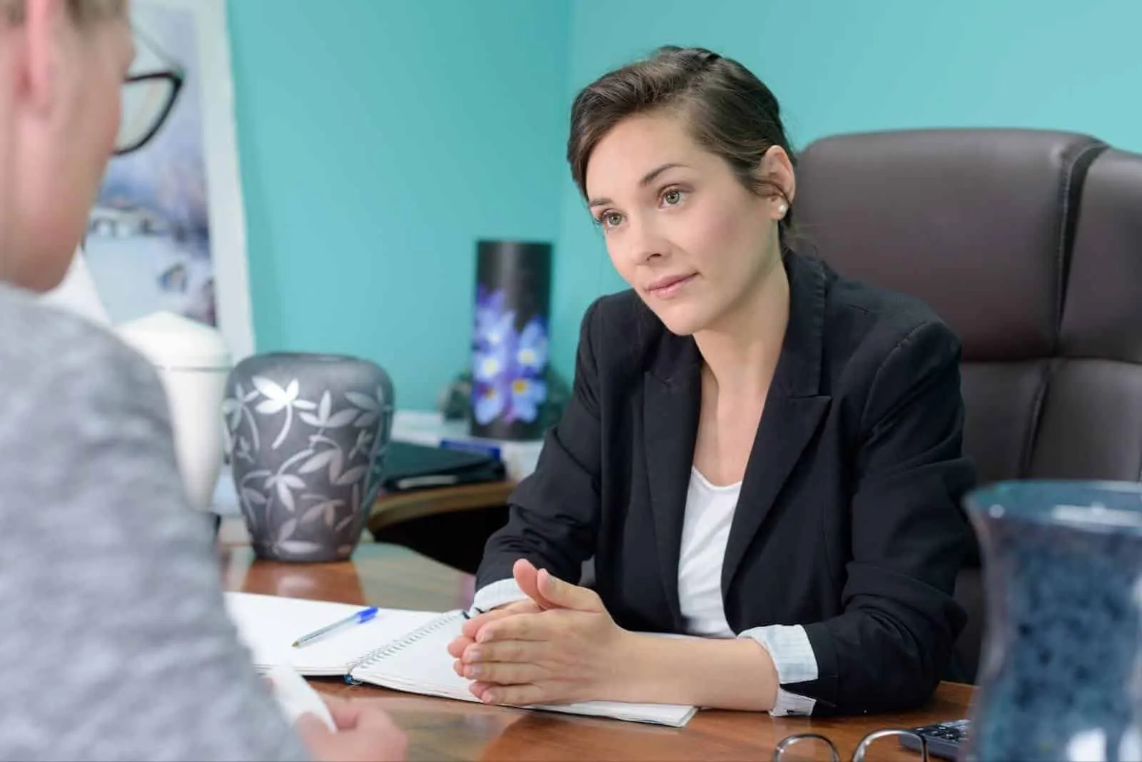 Family member of deceased loved one discussing direct cremation with funeral home