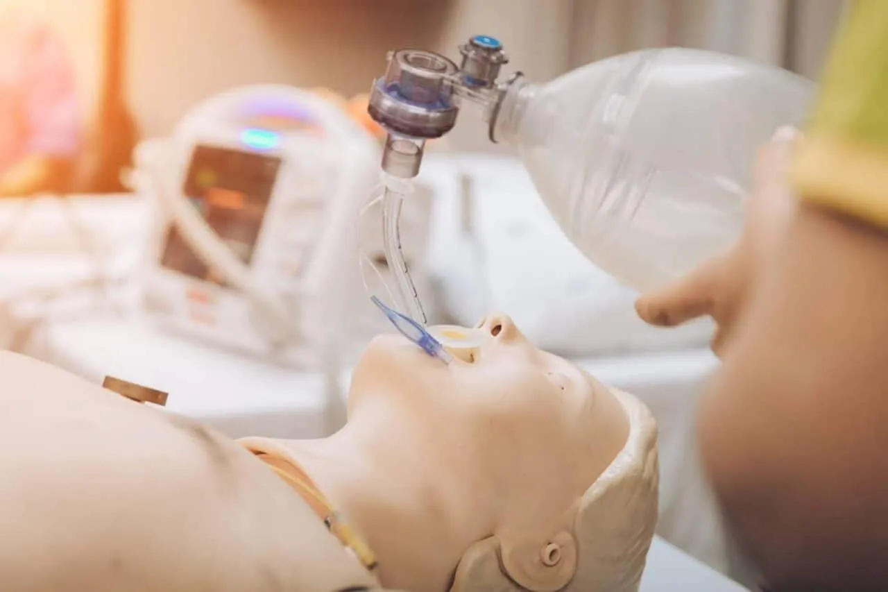 Medical professional performing airway management training