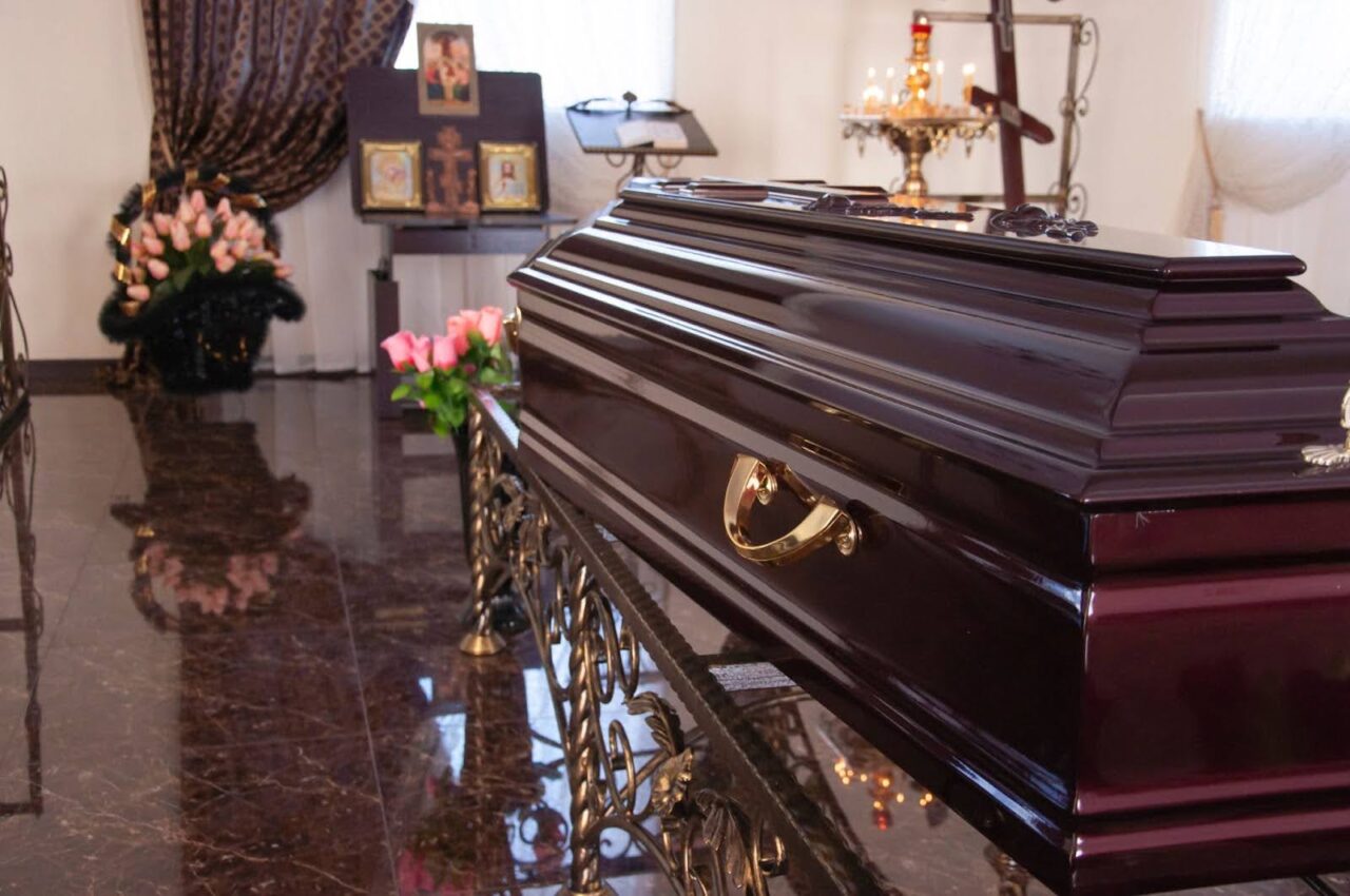 Casket on table at funeral home chapel