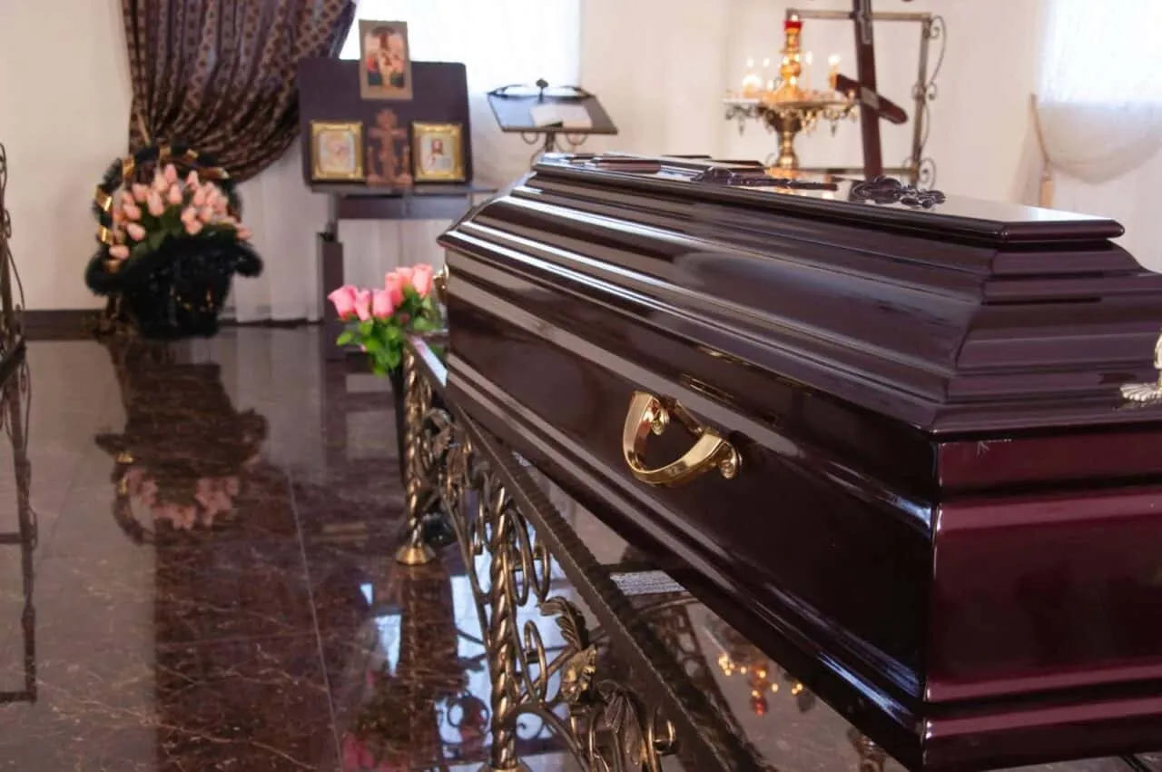 Casket on table at funeral home chapel