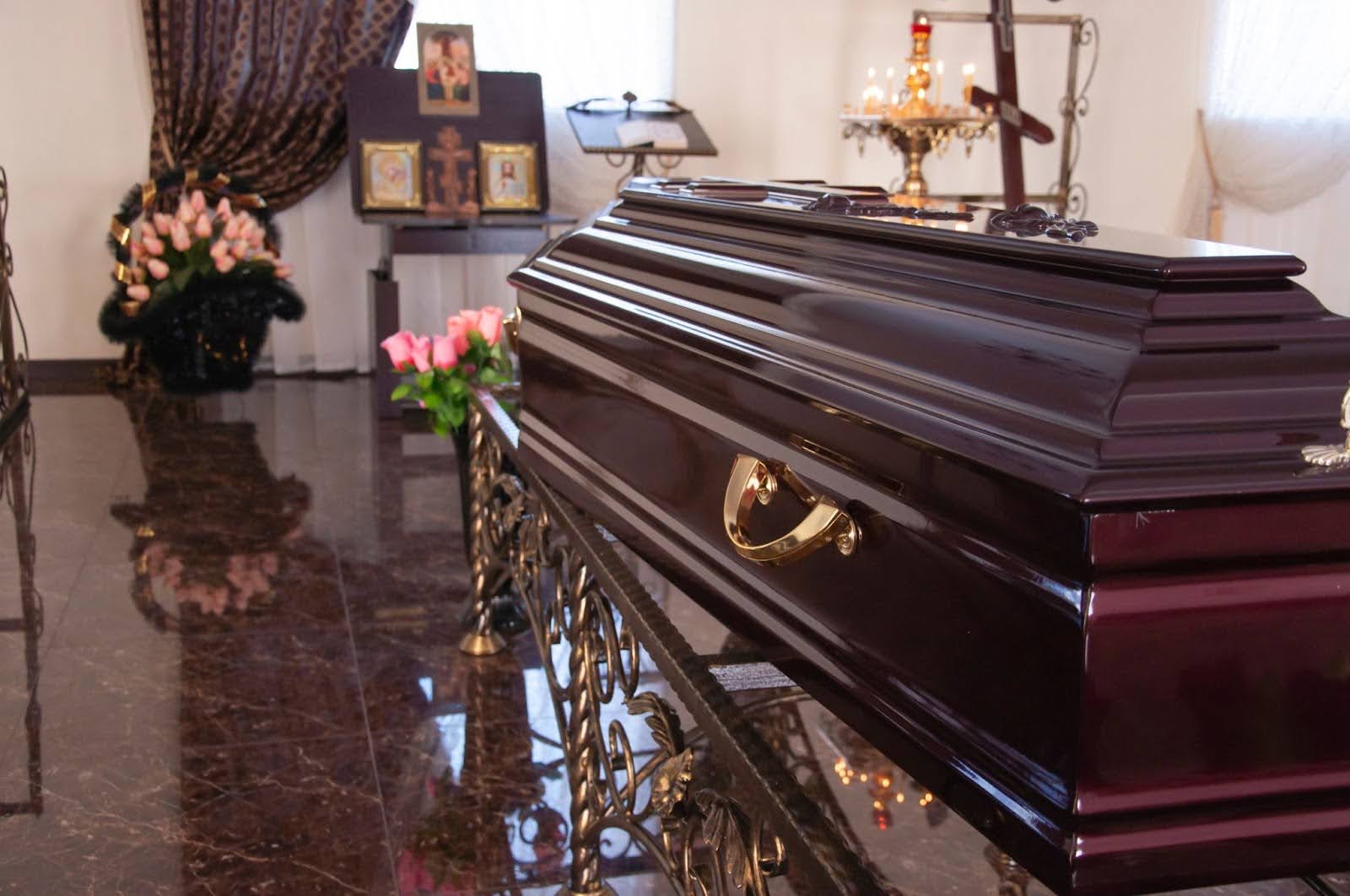 Casket on table at funeral home chapel